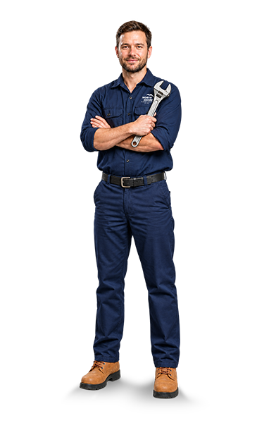 North Shore plumber holding an adjustable wrench with his arms crossed