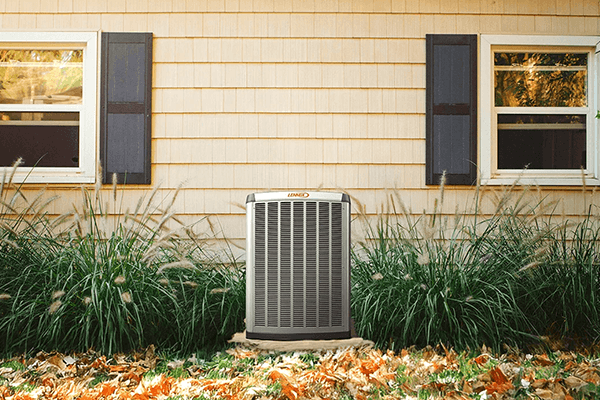 Lennox heat pump outside a North Vancouver home during fall